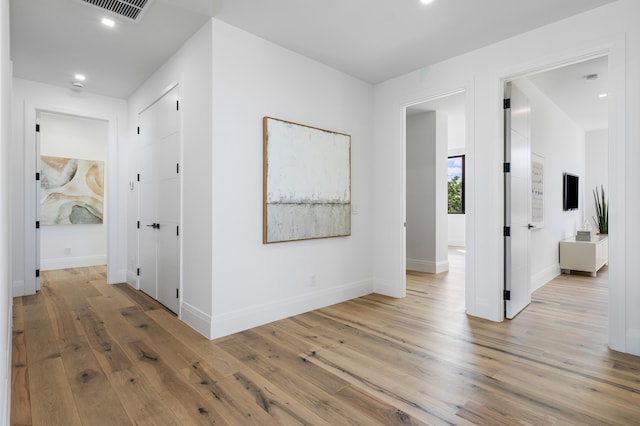 hallway featuring light hardwood / wood-style floors