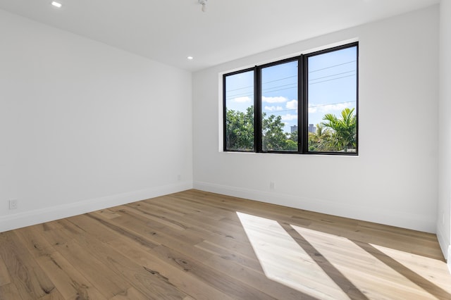 empty room featuring light hardwood / wood-style floors