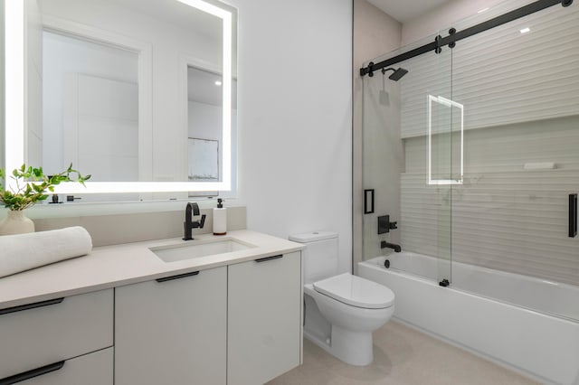 full bathroom with vanity, shower / bath combination with glass door, and toilet