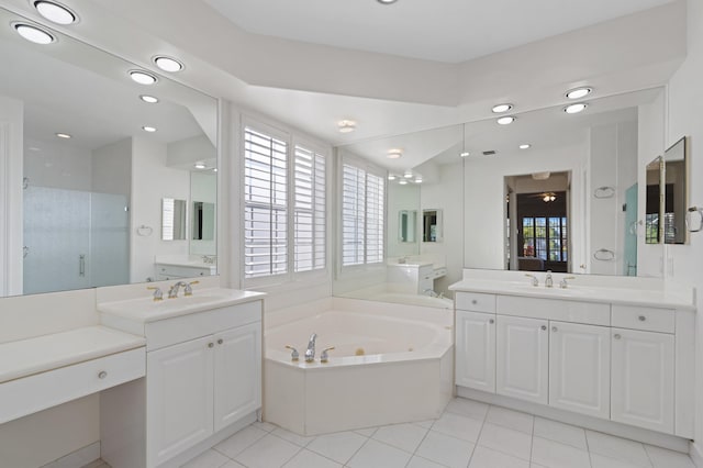 full bath with two vanities, a stall shower, a sink, tile patterned flooring, and a jetted tub