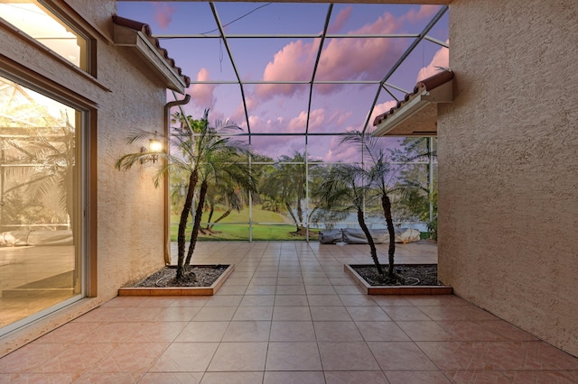 view of patio / terrace with glass enclosure