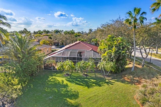 view of yard with a lanai