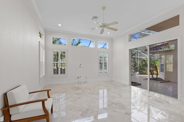 interior space featuring baseboards, visible vents, a sunroom, ornamental molding, and marble finish floor