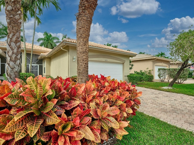 view of side of home with a garage