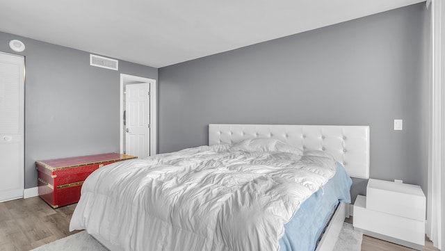 bedroom featuring light hardwood / wood-style flooring