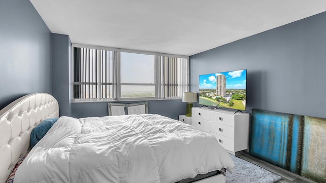 bedroom featuring hardwood / wood-style flooring