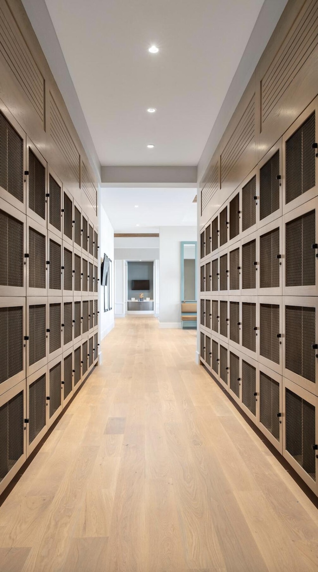 wine cellar with wood-type flooring