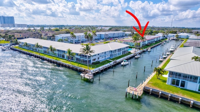 birds eye view of property featuring a water view