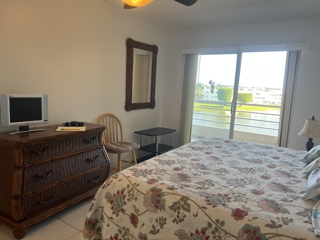 4034 Exeter Unit B, Boca Raton, FL 33434 - bedroom featuring light tile patterned flooring and ceiling fan