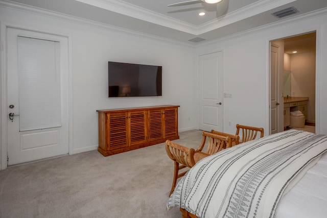 bedroom with recessed lighting, a raised ceiling, visible vents, ornamental molding, and light carpet