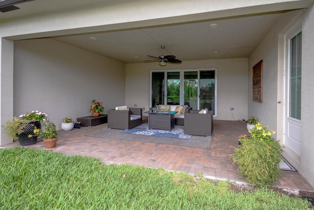 view of patio / terrace featuring a ceiling fan and outdoor lounge area