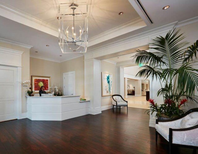 reception area featuring an inviting chandelier