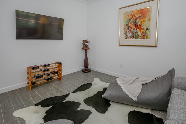 bedroom with wood tiled floor and baseboards