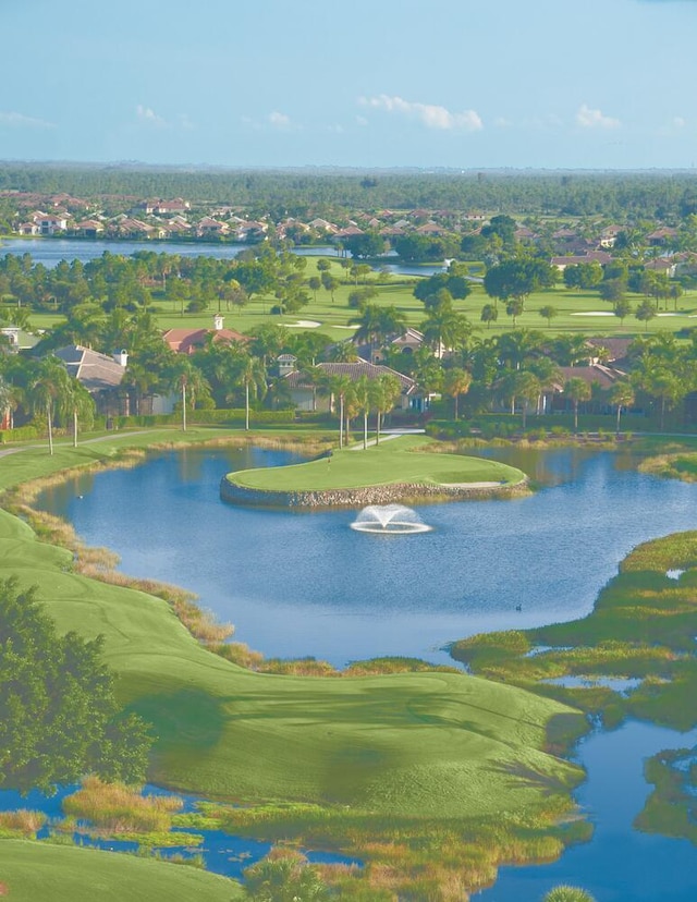 view of home's community with a water view and golf course view