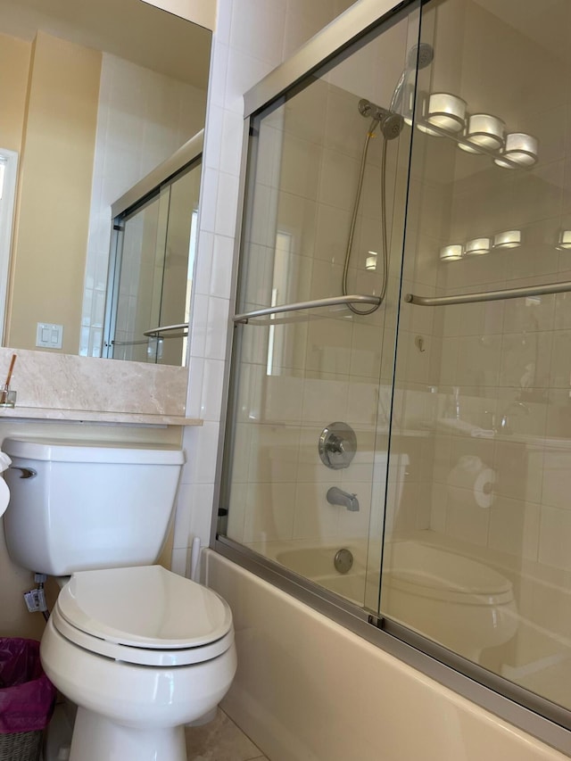 663 Hibiscus St, West Palm Beach, FL 33401 - bathroom with shower / bath combination with glass door and toilet
