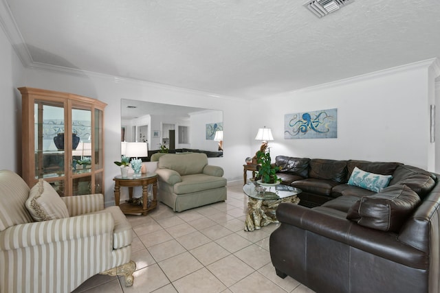 tiled living room with ornamental molding and a textured ceiling