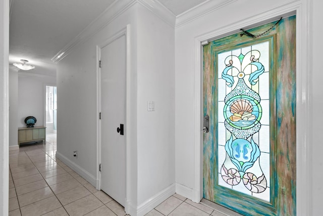 tiled entryway featuring ornamental molding