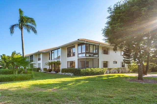 exterior space featuring a front lawn