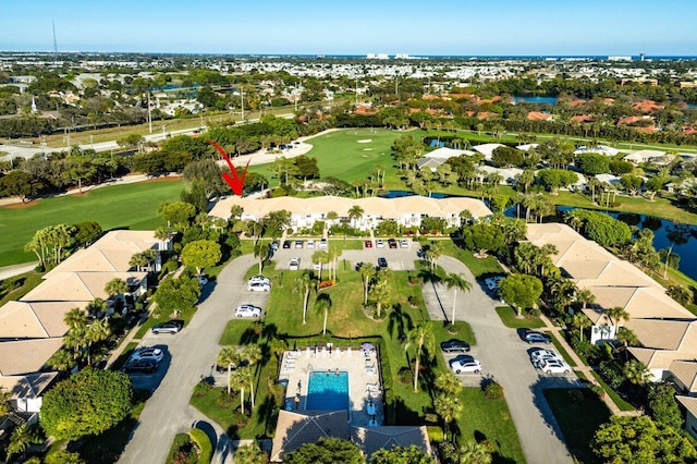 aerial view with a residential view and a water view