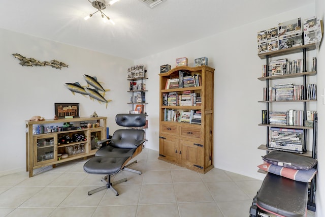 sitting room featuring light tile patterned flooring