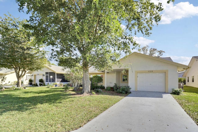 ranch-style house with a garage and a front yard