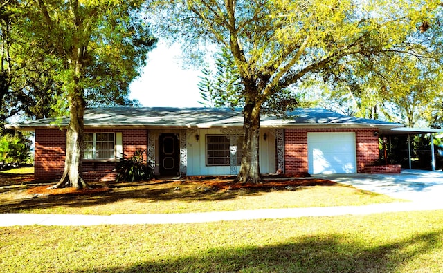 single story home featuring brick siding, an attached garage, a carport, and a front lawn