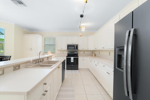 kitchen with pendant lighting, sink, white cabinetry, black appliances, and light tile patterned flooring