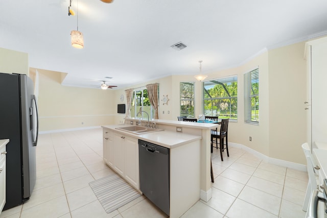 kitchen with sink, black dishwasher, stainless steel fridge with ice dispenser, and hanging light fixtures