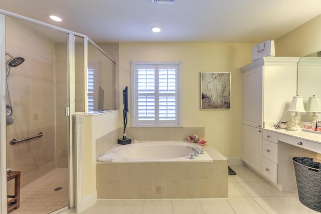 bathroom with plus walk in shower and tile patterned floors