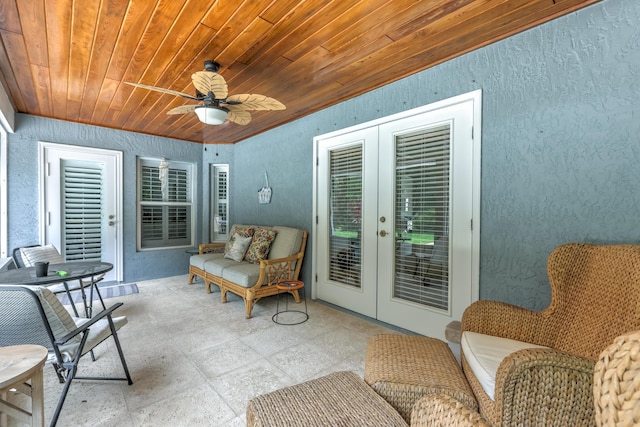 view of patio featuring ceiling fan and french doors