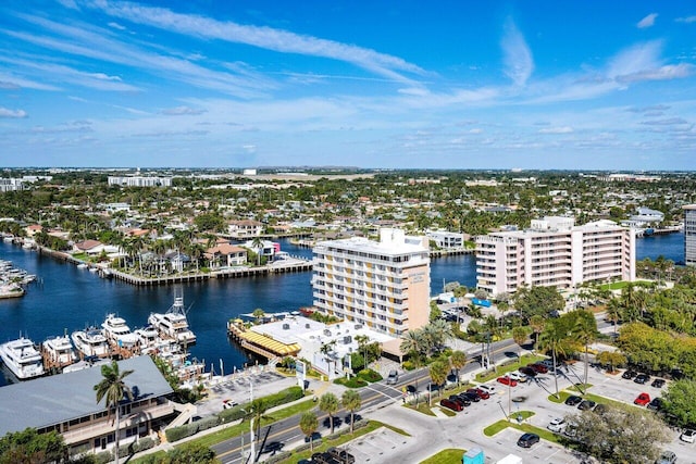 drone / aerial view with a water view and a city view