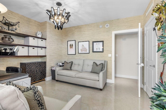 living area featuring a notable chandelier, baseboards, and light tile patterned floors