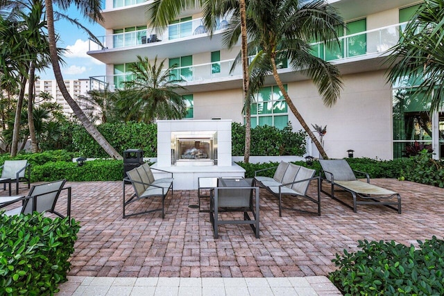 view of patio featuring a tile fireplace