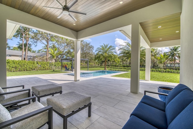 view of patio / terrace featuring ceiling fan