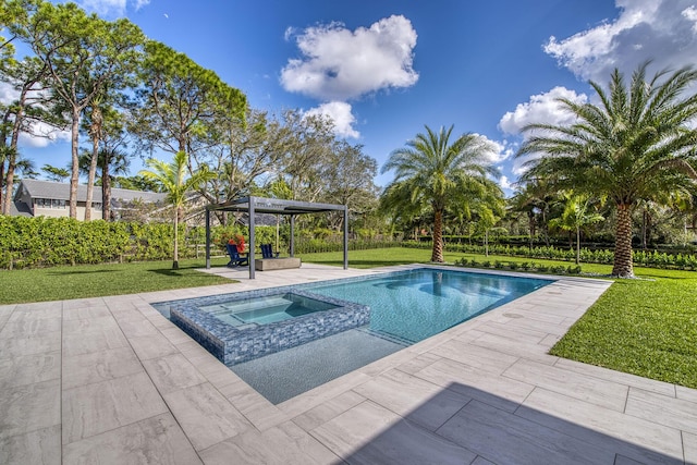 view of swimming pool featuring an in ground hot tub, a yard, and a patio