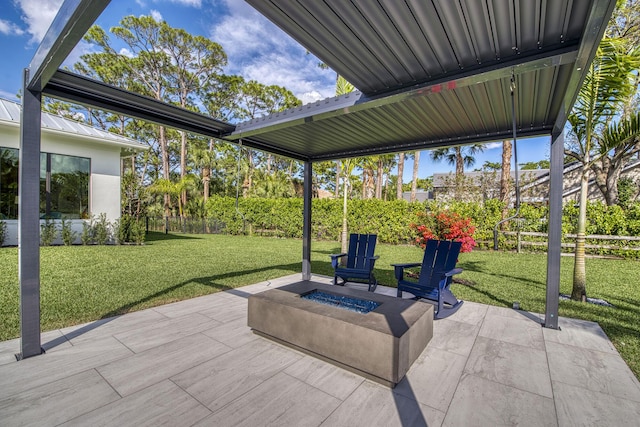 view of patio featuring an outdoor fire pit