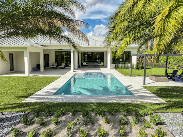 view of pool featuring a lawn and a patio area