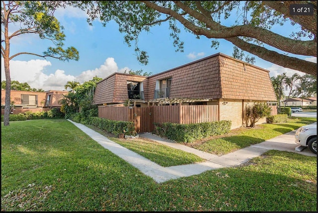 view of home's exterior featuring a lawn