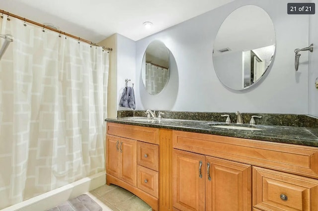 bathroom with vanity, tile patterned floors, and a shower with shower curtain