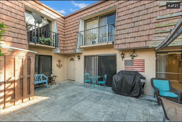 rear view of property with a patio