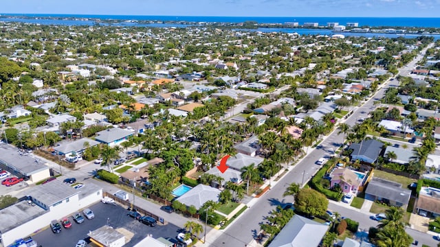 drone / aerial view with a water view