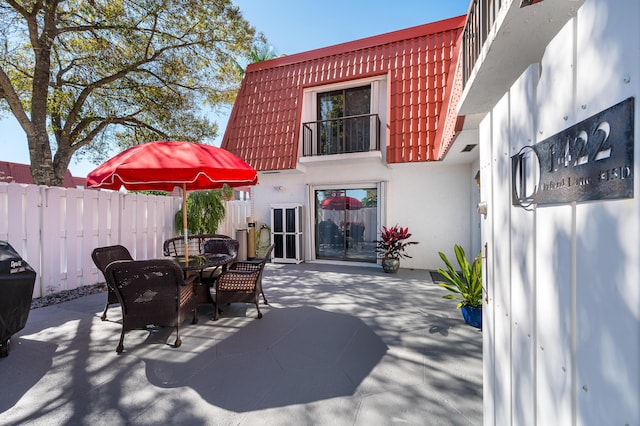 view of patio / terrace featuring a balcony