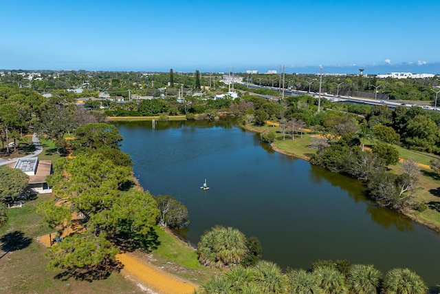 birds eye view of property featuring a water view