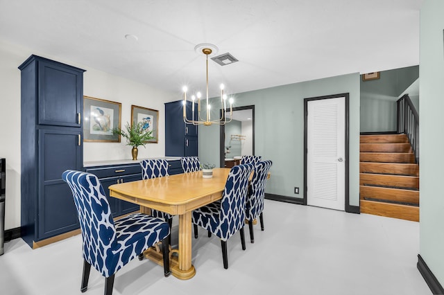 dining area featuring a chandelier