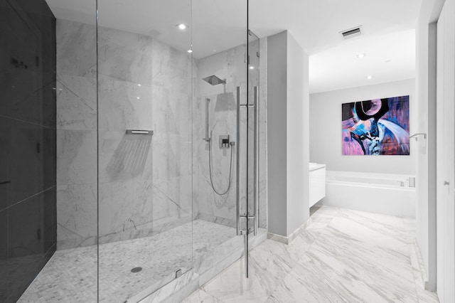 full bath featuring a marble finish shower, visible vents, baseboards, a garden tub, and marble finish floor