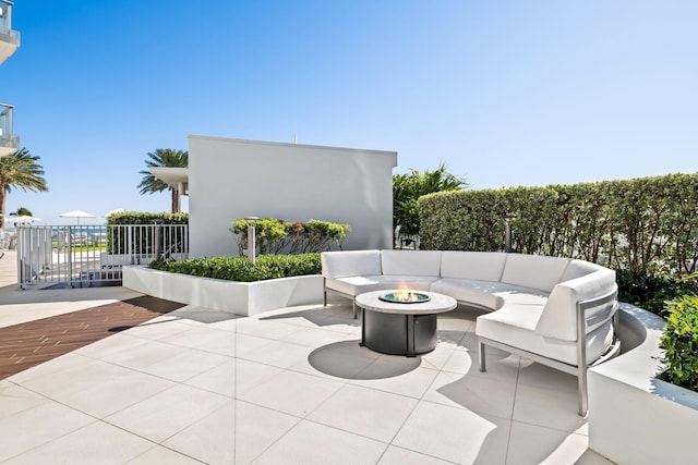 view of patio / terrace with a fire pit