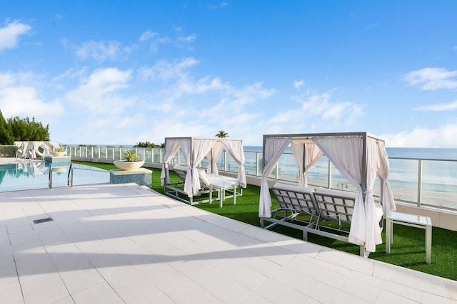 view of patio / terrace featuring a water view