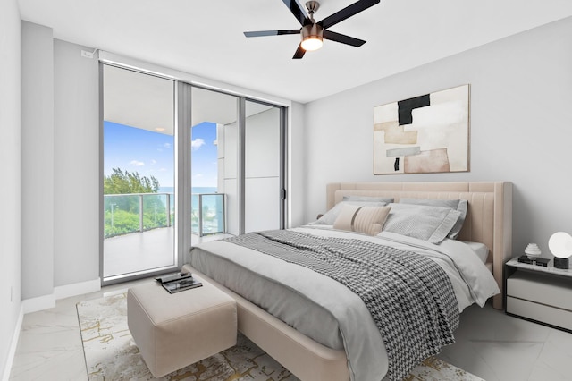 bedroom with baseboards, expansive windows, marble finish floor, a ceiling fan, and access to outside