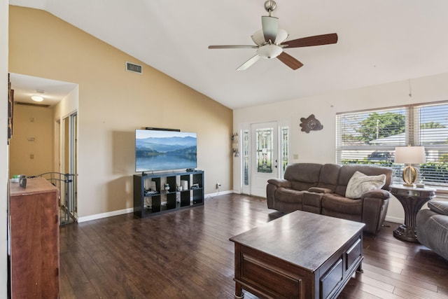 living room with dark wood-type flooring, ceiling fan, and high vaulted ceiling