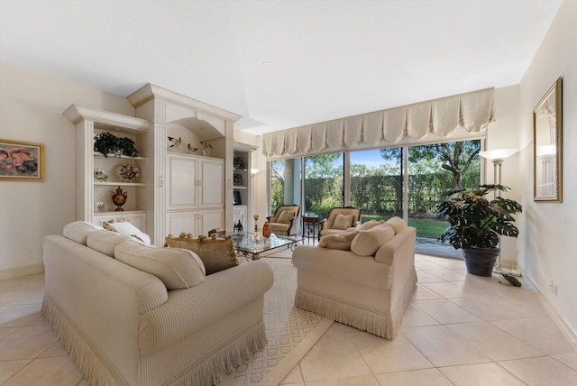 tiled living room with a high ceiling